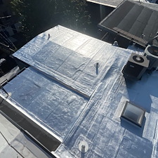 Aluminum-Coating-for-Commercial-Flat-Roofs-in-Chicago-Protect-and-Extend-Roof-Life 4