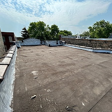 Aluminum-Roof-Coating-Benefits-for-Commercial-Buildings-in-Chicago 1