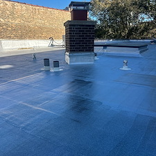 Benefits-of-Aluminum-Coating-for-Flat-Roofs-in-Chicago-Reflective-Protection-Extended-Roof-Life-and-Energy-Savings 1