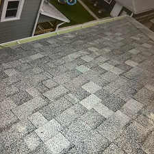 Buckling-Plywood-on-a-Commercial-Shingle-Roof-in-Chicago-Causes-and-Repair-Solutions 2