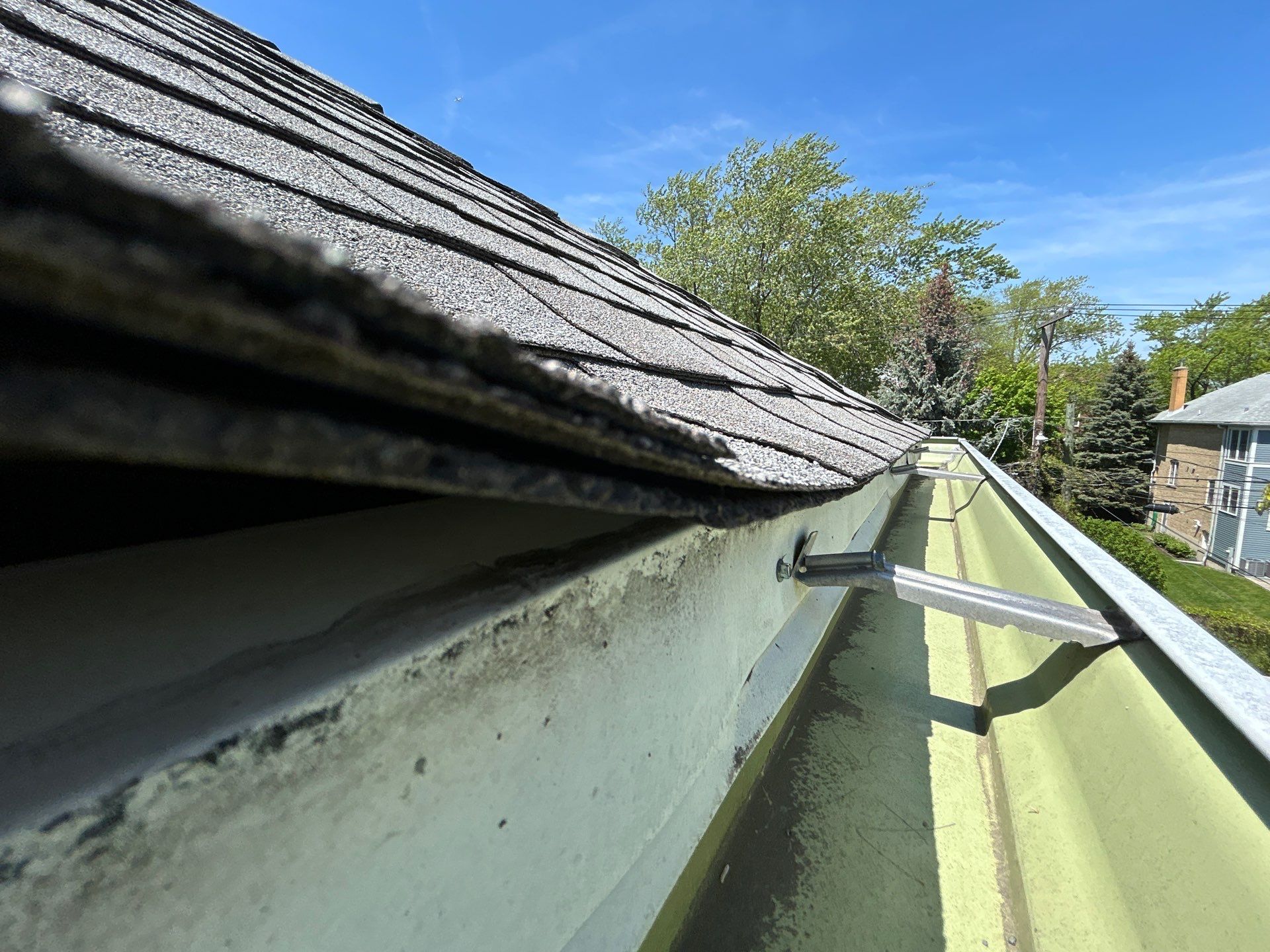 Can I replace my main shingle roof and low-slope dormer roof at the same time?
