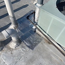 Chicago-Commercial-Flat-Roof-Leaking-Around-Protrusions-Get-It-Fixed 0