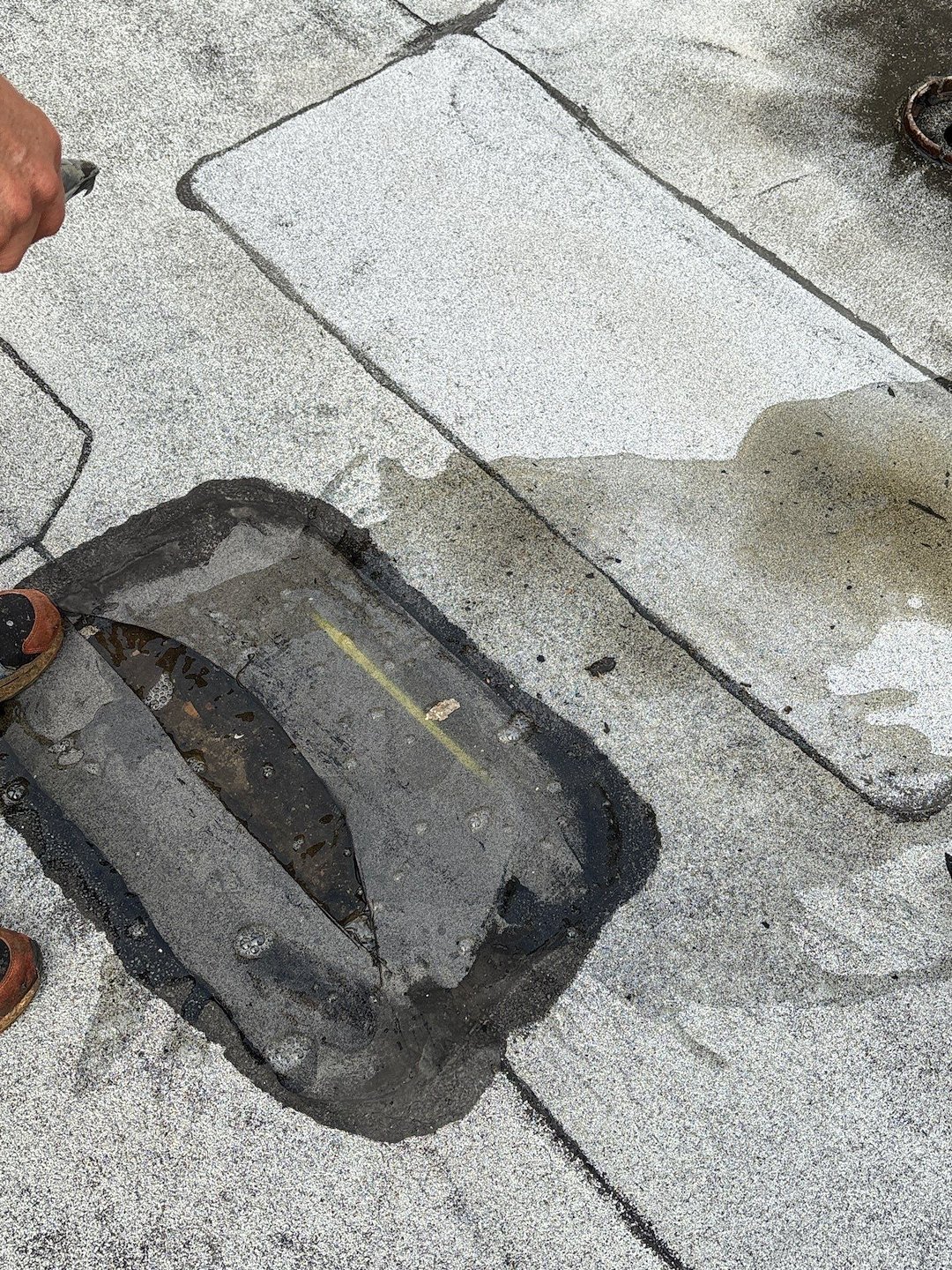 Chicago Commercial Flat Roof Repairs: What to Do If Water Is Trapped Under the Membrane