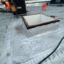 Cricket-Installation-for-Skylights-to-Divert-Water-Commercial-Roofing-in-Chicago 0