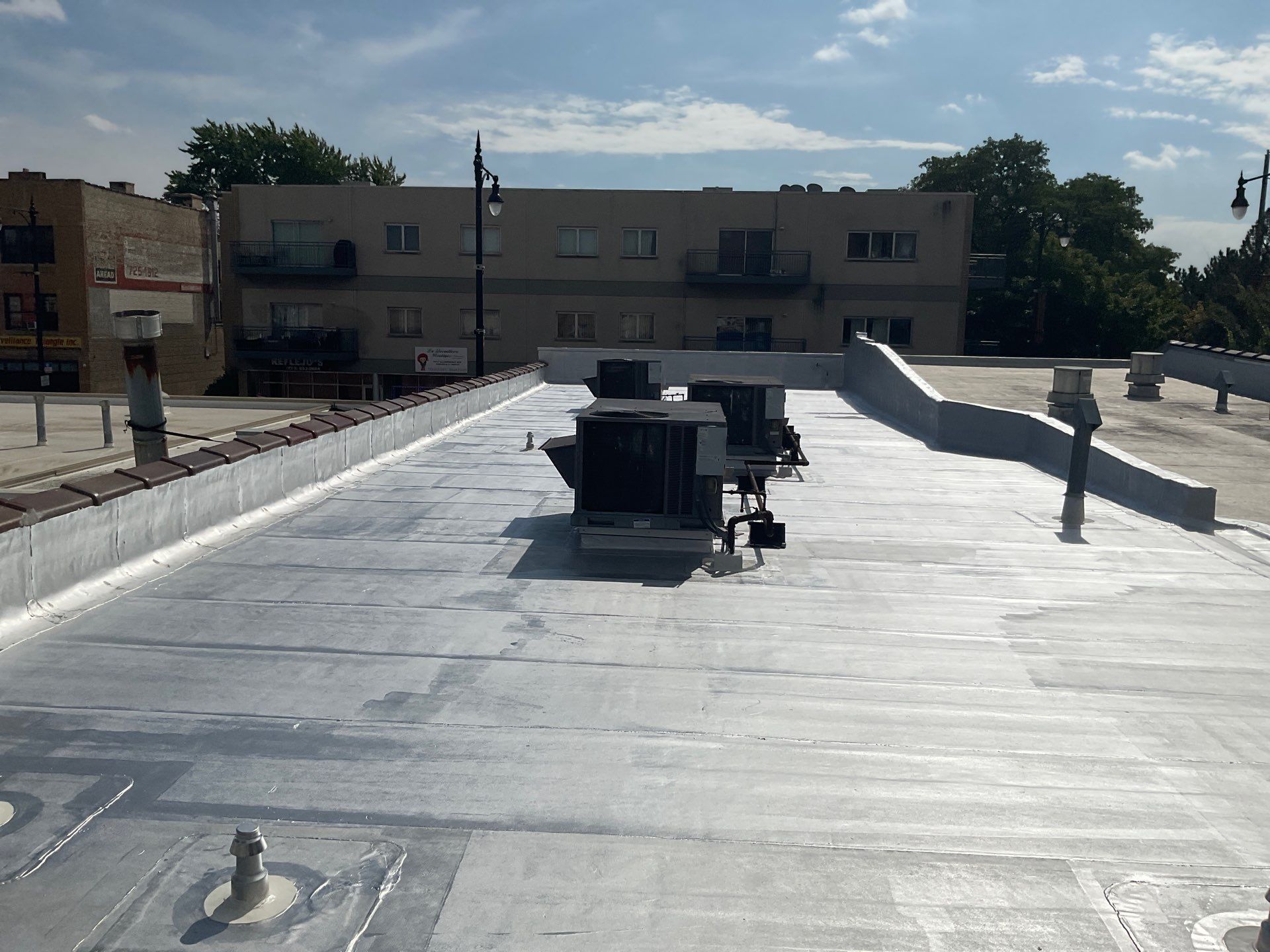 Expert Commercial Flat Roof Replacement in Chicago with New Modified Bitumen Membrane