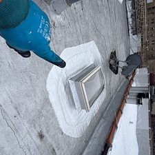 Expert-Cricket-Installation-Alongside-Skylights-on-Chicago-Flat-Roofs 3