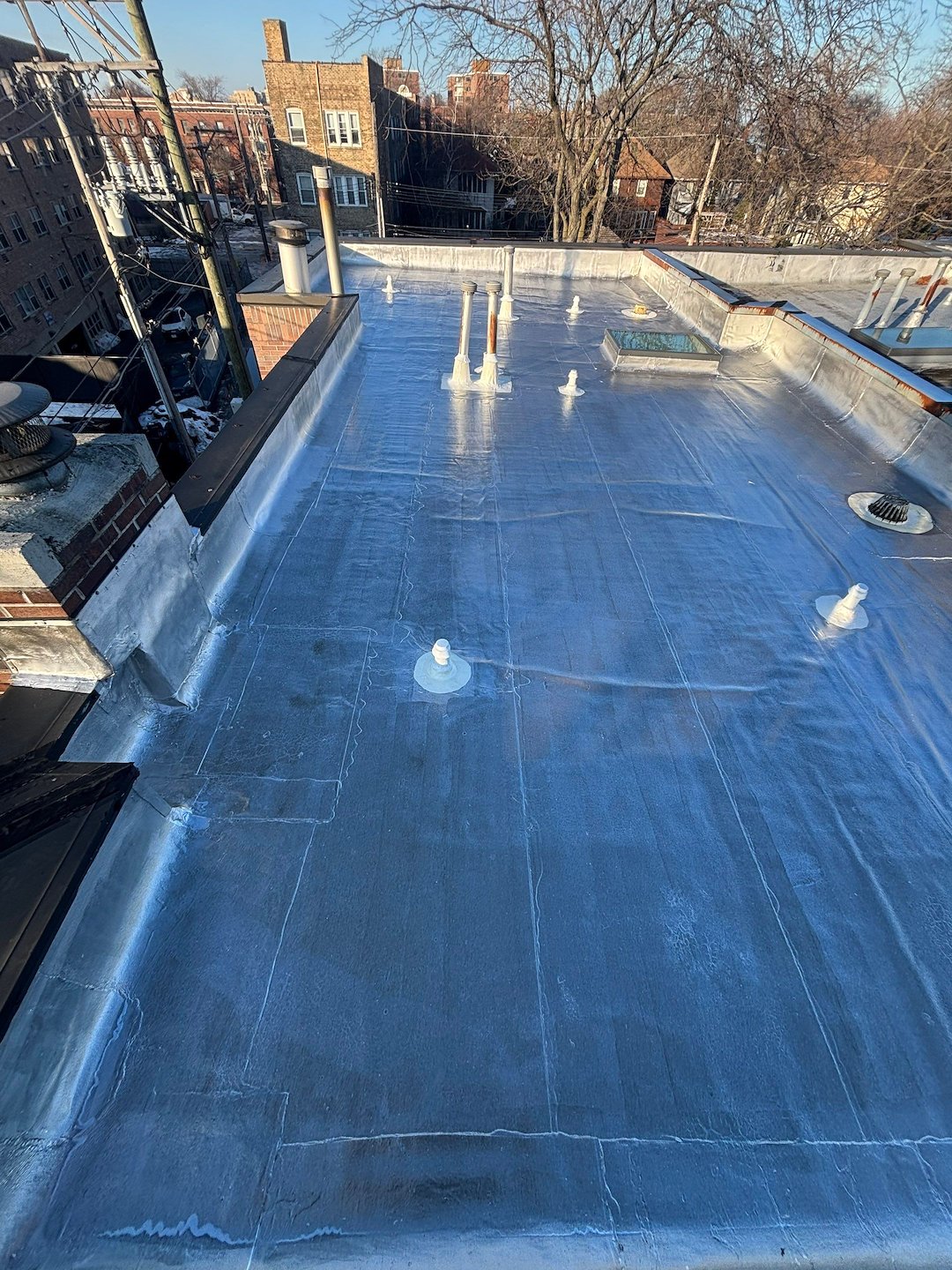 Flat Roof Aluminum Coating Services in Chicago – Protect & Extend Roof Life