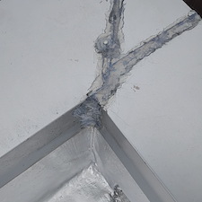 Flat-Roof-Leak-in-Chicago-Fixing-Leaks-from-Open-Coping-Seams 2