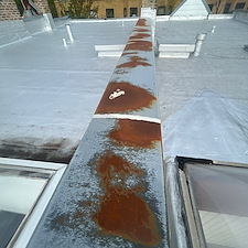 Flat-Roof-Leaking-in-Chicago-Gaps-in-Metal-Coping-Seams-Could-Be-the-Cause 0