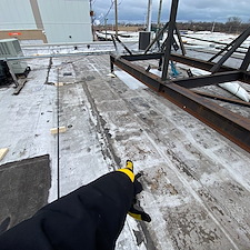 Flat-Roof-Leaking-in-Morton-Grove-Check-for-Holes-Popping-Nails 4