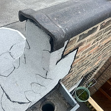 Flat-Roof-Leaks-Along-Gutter-Area-in-Chicago-How-to-Fix-and-Prevent-Damage 1