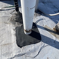 Flat-Roof-Leaks-in-Mount-Prospect-Leaking-Pipe-Boots-Could-Be-the-Cause 1