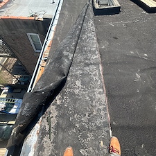 Flat-Roof-Membrane-Lifting-in-Niles-What-to-Do 2