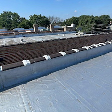 Gaps-in-Clay-Coping-on-a-Flat-Roof-in-Chicago 0