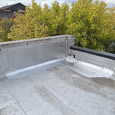 How-Loose-Flashing-Around-Scuppers-Can-Affect-Your-Chicago-Flat-Roof 1
