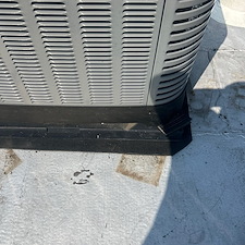 HVAC-Condenser-Sinking-Into-Roof-Membrane-Risks-of-Leaks-and-Damage 2