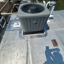 HVAC-Condenser-Sinking-Into-Roof-Membrane-Risks-of-Leaks-and-Damage 3