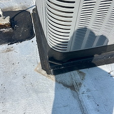 HVAC-Condenser-Sinking-Into-Roof-Membrane-Risks-of-Leaks-and-Damage 1
