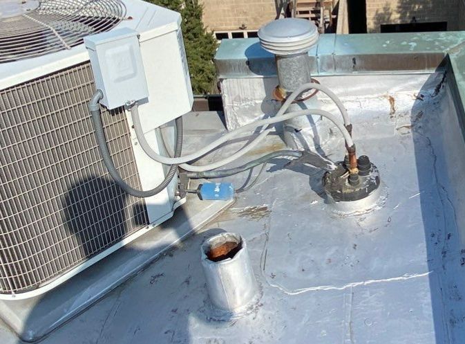 Leaking Roof Around HVAC Portal? Chicago Commercial Roof Repair Services