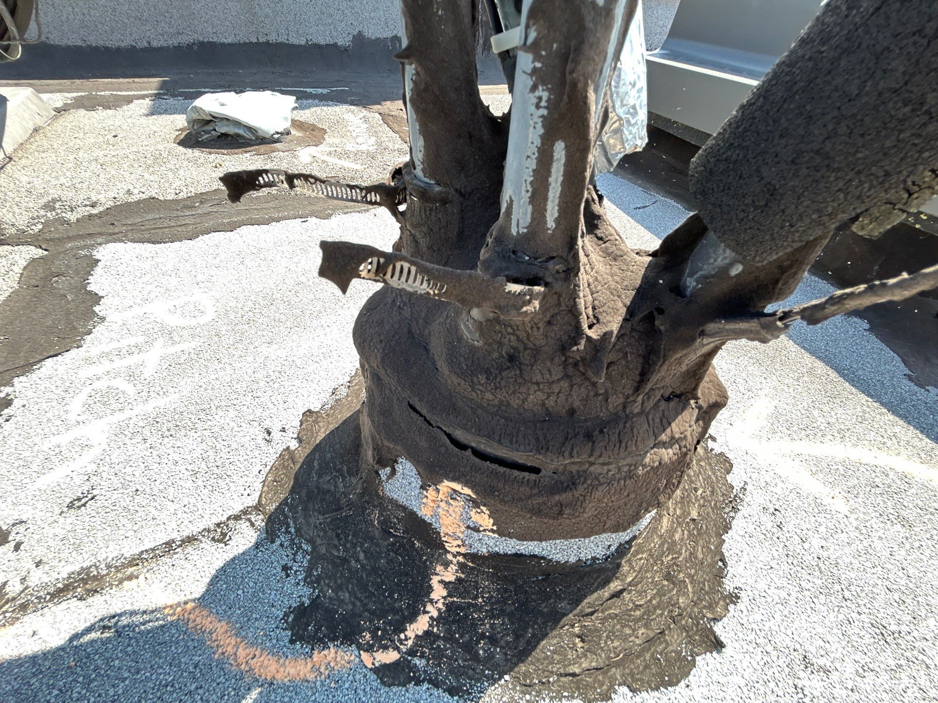 Leaky and Aging HVAC Portal Causing Roof Leaks on a Commercial Flat Roof in Chicago