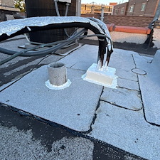 Leaky-and-Aging-HVAC-Portal-Causing-Roof-Leaks-on-a-Commercial-Flat-Roof-in-Chicago 0