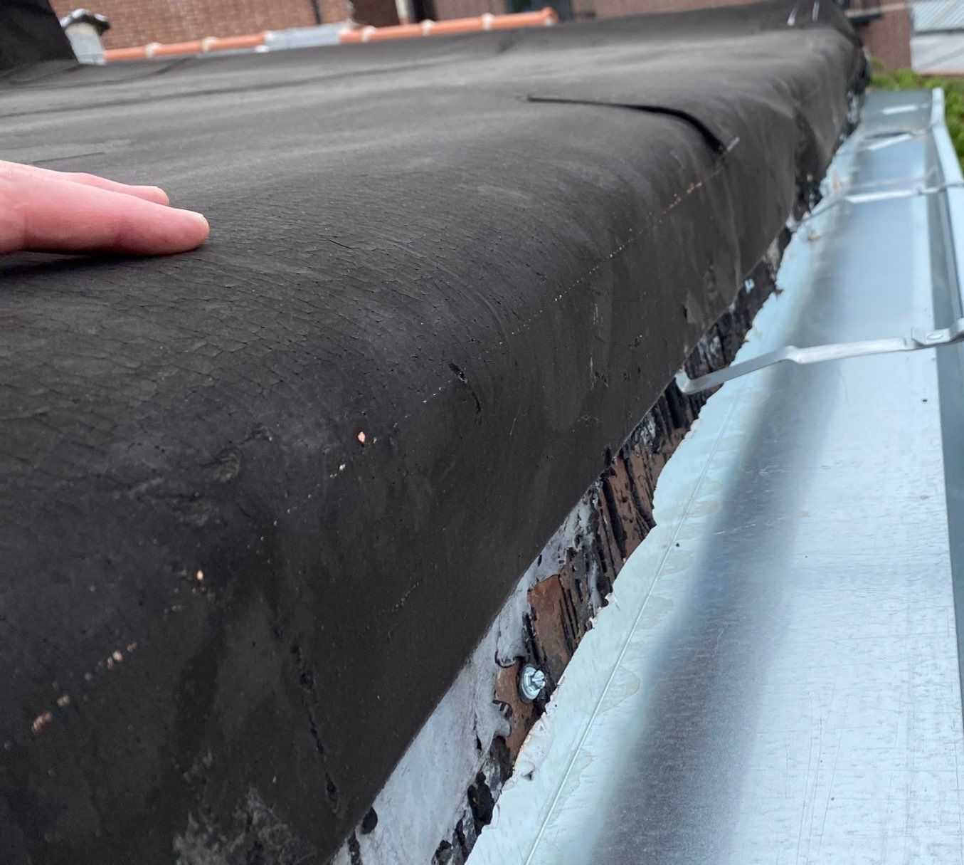 Loose Roof Membrane Along Gutter? Trusted Commercial Roof Repairs in Chicago