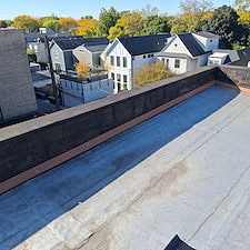 Loose-Wall-Flashing-on-Chicago-Flat-Roofs-Roof-Repairs-by-Anchor-Point-Roofing 2