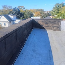 Loose-Wall-Flashing-on-Chicago-Flat-Roofs-Roof-Repairs-by-Anchor-Point-Roofing 3