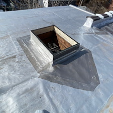 Low-Hatch-Curb-Causing-Water-Intrusion-on-Flat-Roof-in-Skokie-Heres-How-We-Fixed-It 0