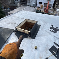 Low-Hatch-Curb-Causing-Water-Intrusion-on-Flat-Roof-in-Skokie-Heres-How-We-Fixed-It 5