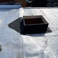 Low-Hatch-Curb-Causing-Water-Intrusion-on-Flat-Roof-in-Skokie-Heres-How-We-Fixed-It 2
