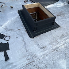 Low-Hatch-Curb-Causing-Water-Intrusion-on-Flat-Roof-in-Skokie-Heres-How-We-Fixed-It 4