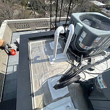 Old-HVAC-Line-Portal-Causing-Flat-Roof-Damage-in-Chicago 0