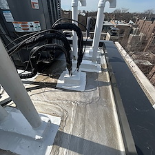 Old-HVAC-Line-Portal-Causing-Flat-Roof-Damage-in-Chicago 1