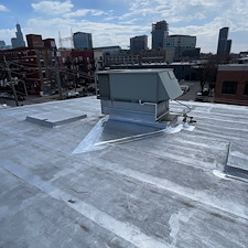 Ponding-Water-on-Park-Ridge-Flat-Roof-Ask-About-Cricket-Installation 1