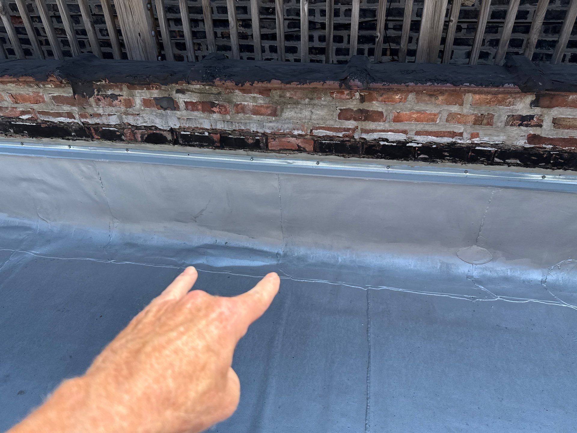 Prevent Water Damage: Addressing Trapped Moisture Under Commercial Flat Roofs in Chicago