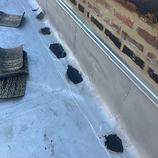 Prevent-Water-Damage-Addressing-Trapped-Moisture-Under-Commercial-Flat-Roofs-in-Chicago 2