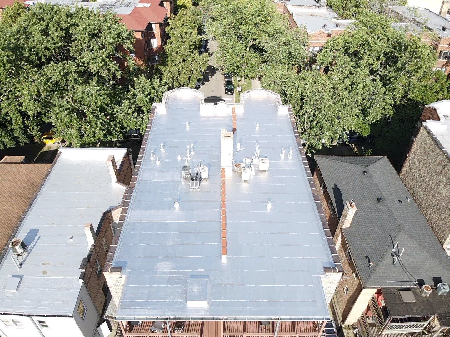 Protect Your Chicago Commercial Flat Roof from UV with Aluminum Coating