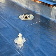 Roof-Drain-Flashing-Repair-for-Flat-Roofs-in-Chicago-Anchor-Point-Roofing 1