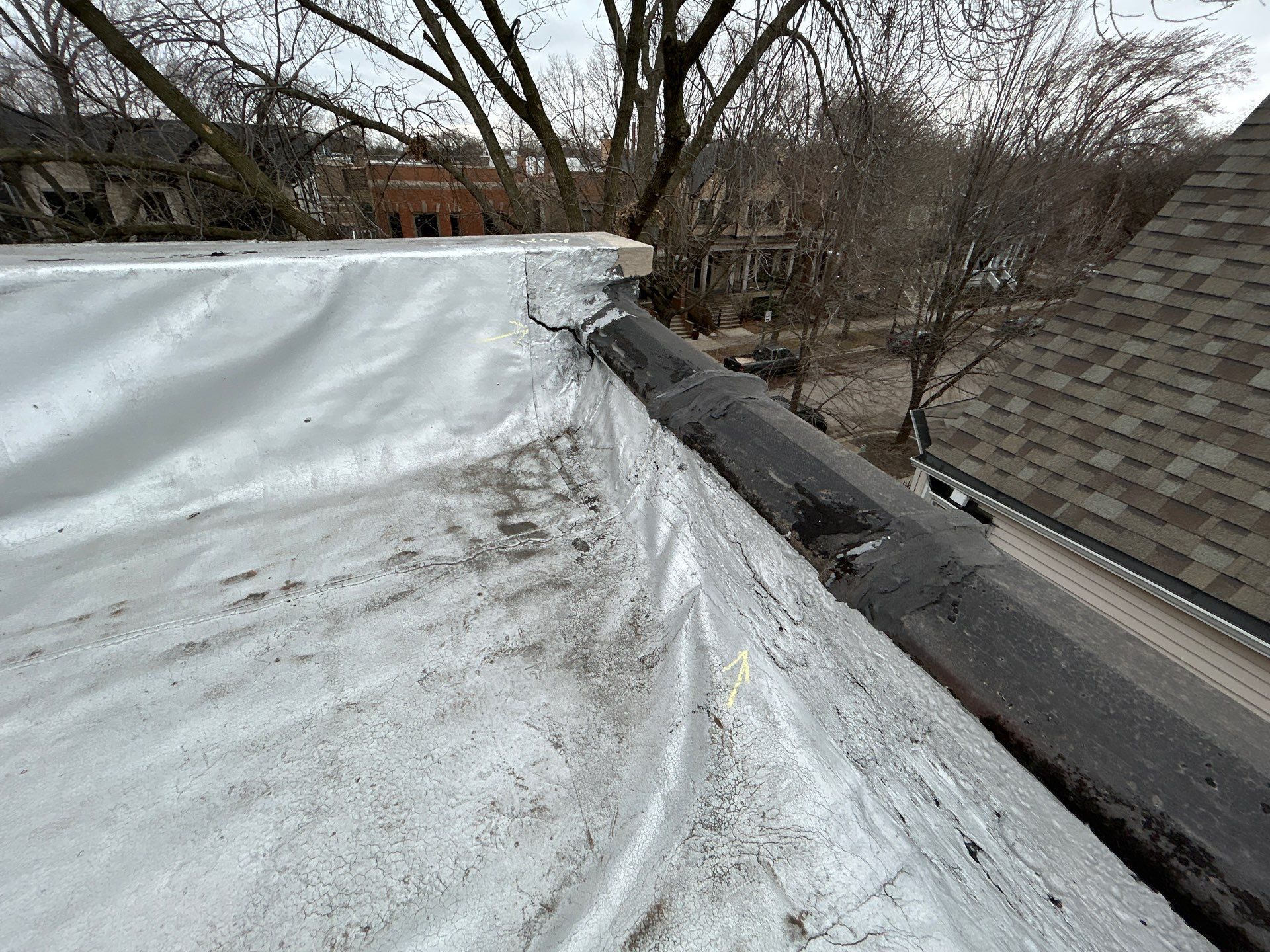 What Causes a Flat Roof Membrane to Come Loose and Leak?