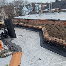 What-Causes-a-Flat-Roof-Membrane-to-Come-Loose-and-Leak 0