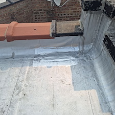 What-Happens-When-Water-Gets-Trapped-Under-a-Flat-Roofing-Membrane 0