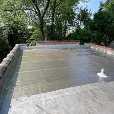 What-to-Do-If-Water-Is-Trapped-Under-a-Commercial-Flat-Roof-Membrane-in-Chicago 1