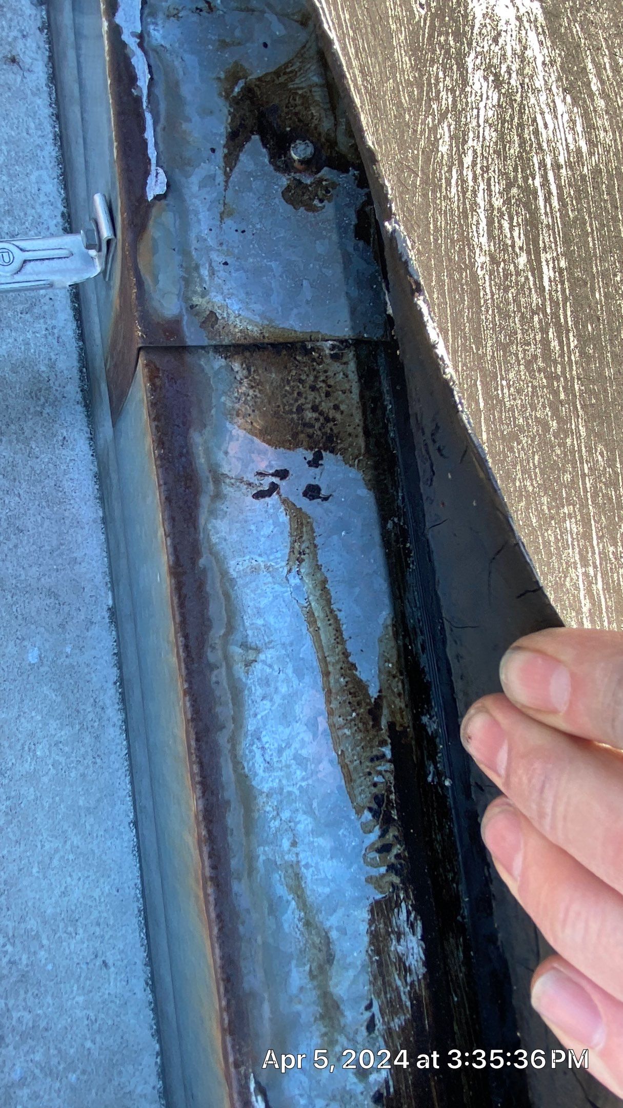 Why does my flat roof seem to have a better water collection system than my actual gutters?