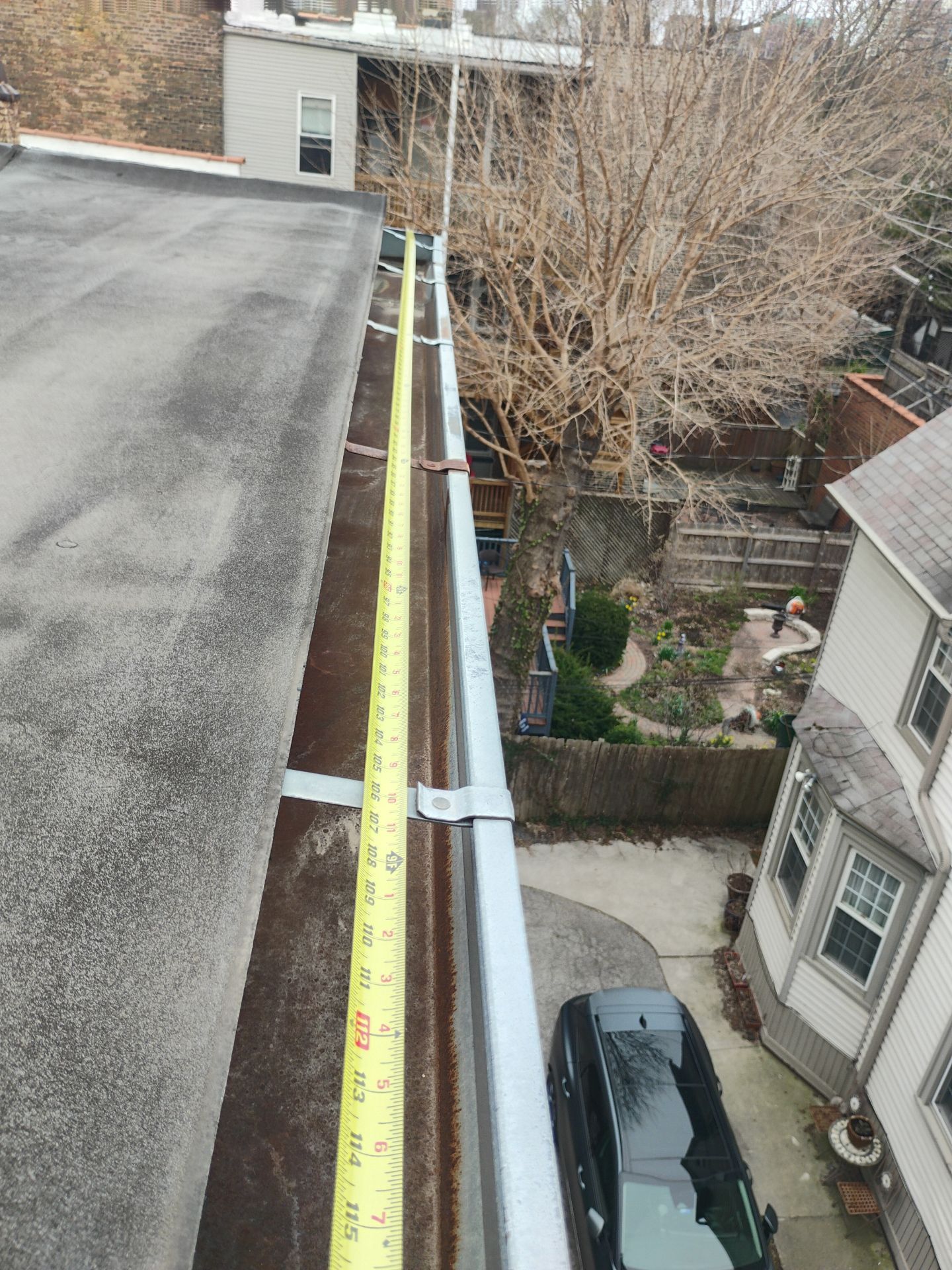 Why Does Water Keep Dripping Behind My Gutter Instead of Into It?