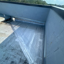 Why-Installing-a-Cricket-on-Your-Commercial-Flat-Roof-in-Chicago-Prevents-Costly-Water-Damage 0