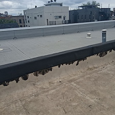 Why-Is-My-Parapet-Wall-Flashing-Loose-and-Could-It-Be-Causing-Roof-Leaks 1