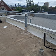 Why-Is-My-Parapet-Wall-Flashing-Loose-and-Could-It-Be-Causing-Roof-Leaks 3