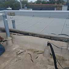 Why-Is-My-Parapet-Wall-Flashing-Loose-and-Could-It-Be-Causing-Roof-Leaks 0