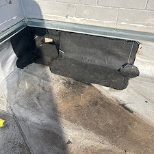 Why-Is-My-Roof-Leaking-Near-the-Scupper-Area 2